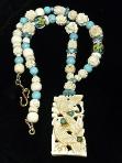 C3050 Carved bone birds, carved bone, turquoise, and glass flower necklace
